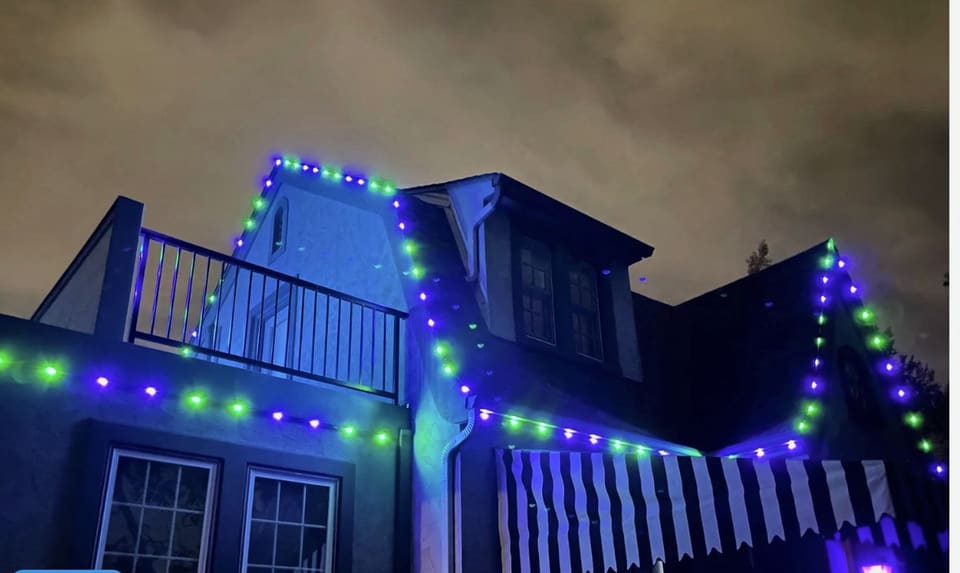 Home with permanent lights in alternating blue and green