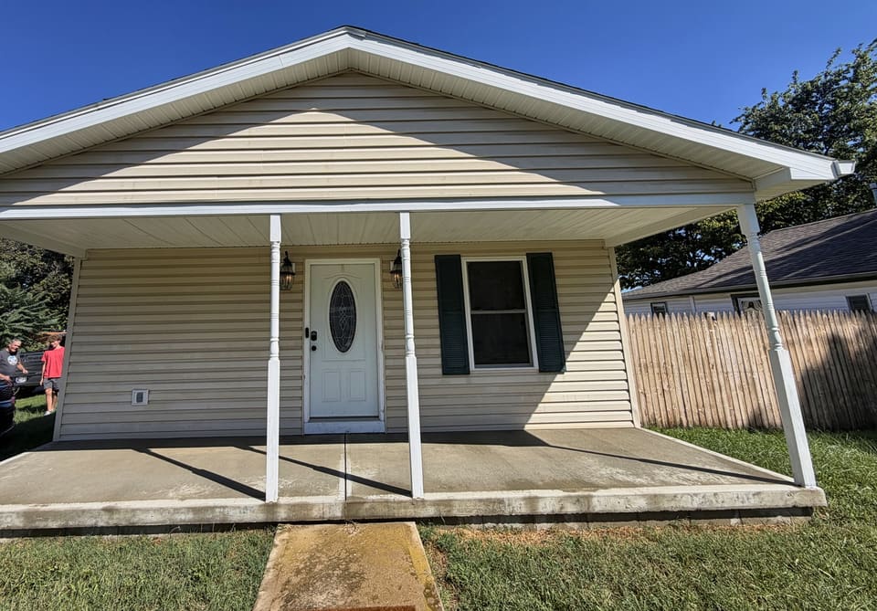 After: covered porch and front walk, washed clean